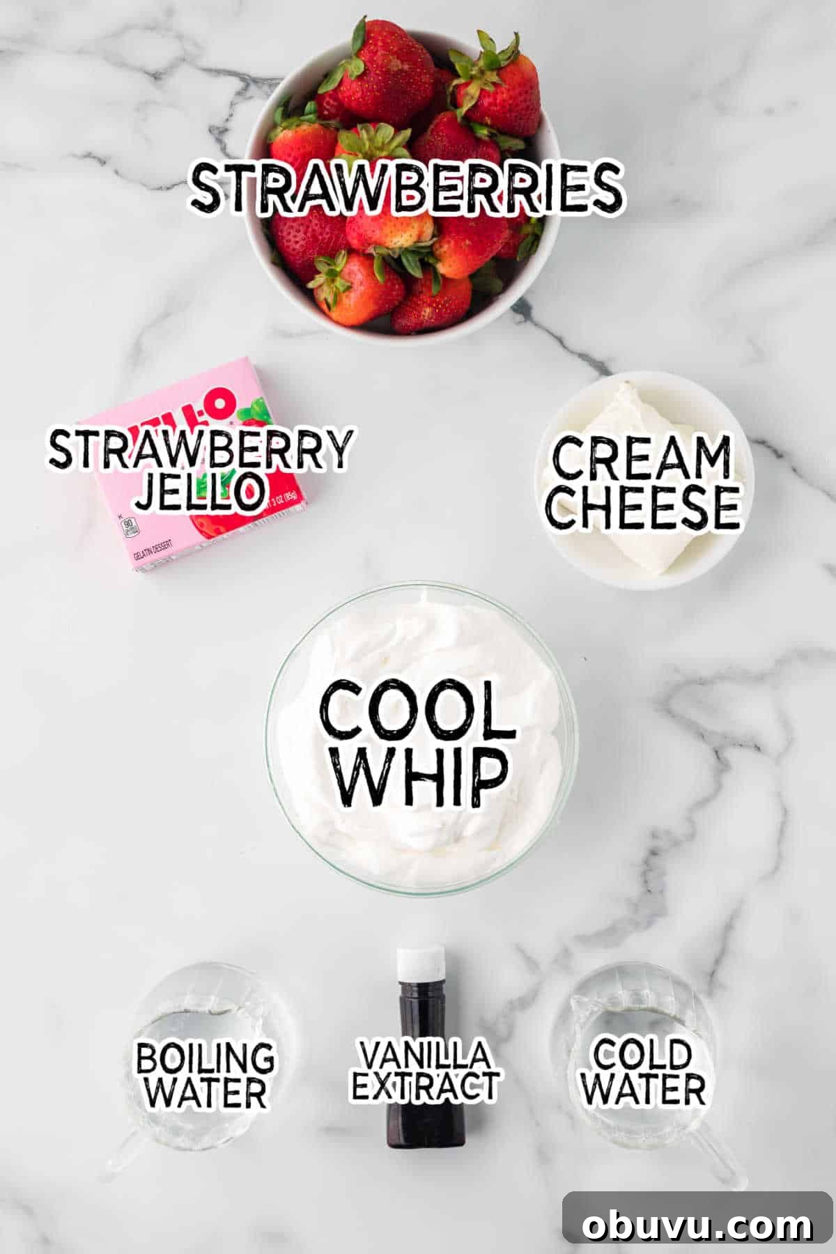 Ingredients on a white marble counter.