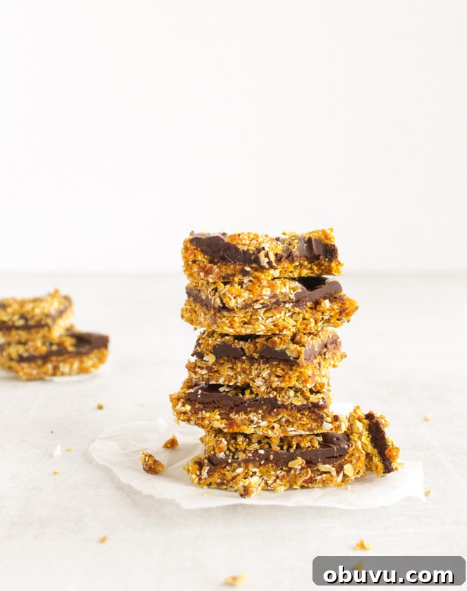 Turmeric Chocolate Snack Bars with Almonds and Sea Salt 8 Healthy Turmeric Chocolate Snack Bars - packed with good-for-you ingredients. Perfect for a snack anytime of the day! Only takes 15 minutes to make! #glutenfree #vegan #easyrecipe #turmeric #dates #healthysnack | robustrecipes.com