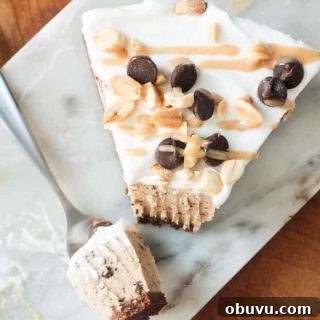 No-Bake Peanut Butter Chocolate Chip Pie Recipe 2 Slice of frozen chocolate chip pie with a bite taken out with a fork.