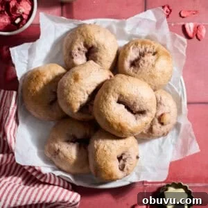 Strawberry Sourdough Discard Bagels: Soft, Tangy & Fresh 17 Sourdough Discard Strawberry Bagels on a white platter.