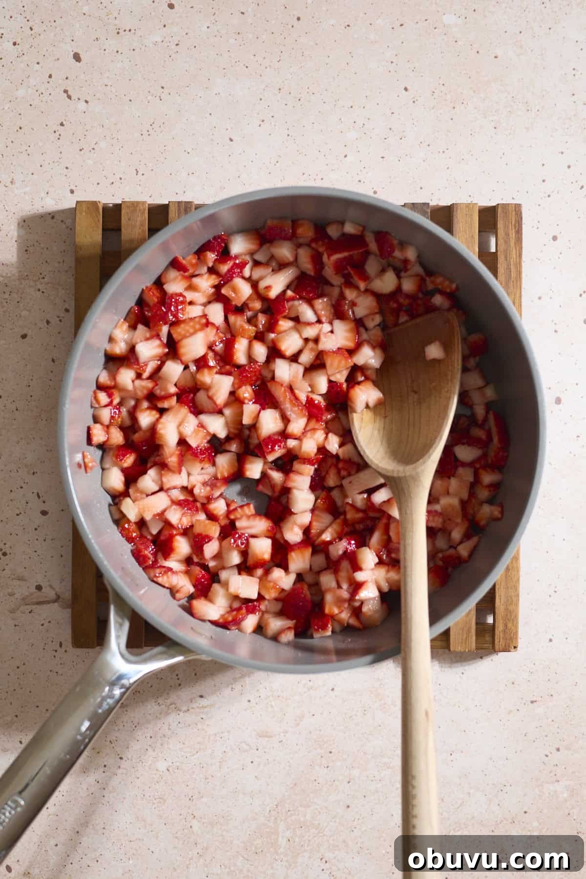 Strawberry Sourdough Discard Bagels: Soft, Tangy & Fresh 5 Diced berries in a large skillet.