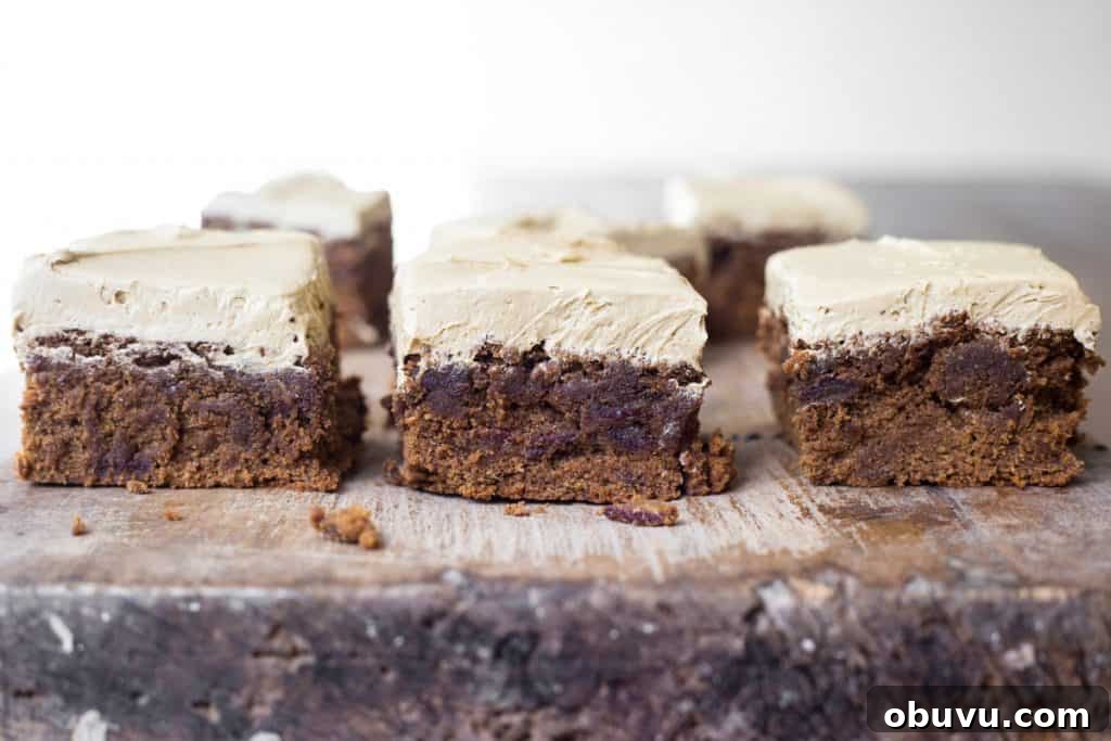 Slices of Sticky Date Cake on a wooden board