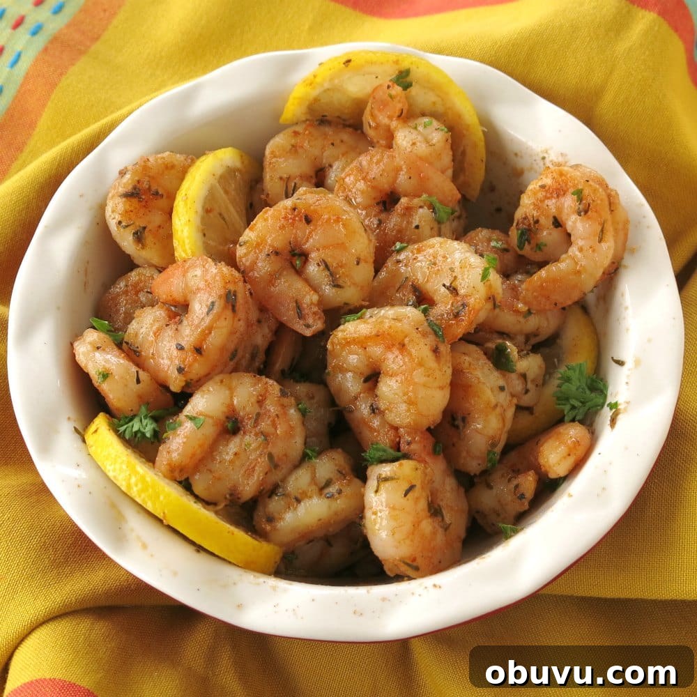 Cajun Shrimp Guacamole Bites: Spicy Shrimp Appetizer Recipe 3 Blackened shrimp in a bowl.