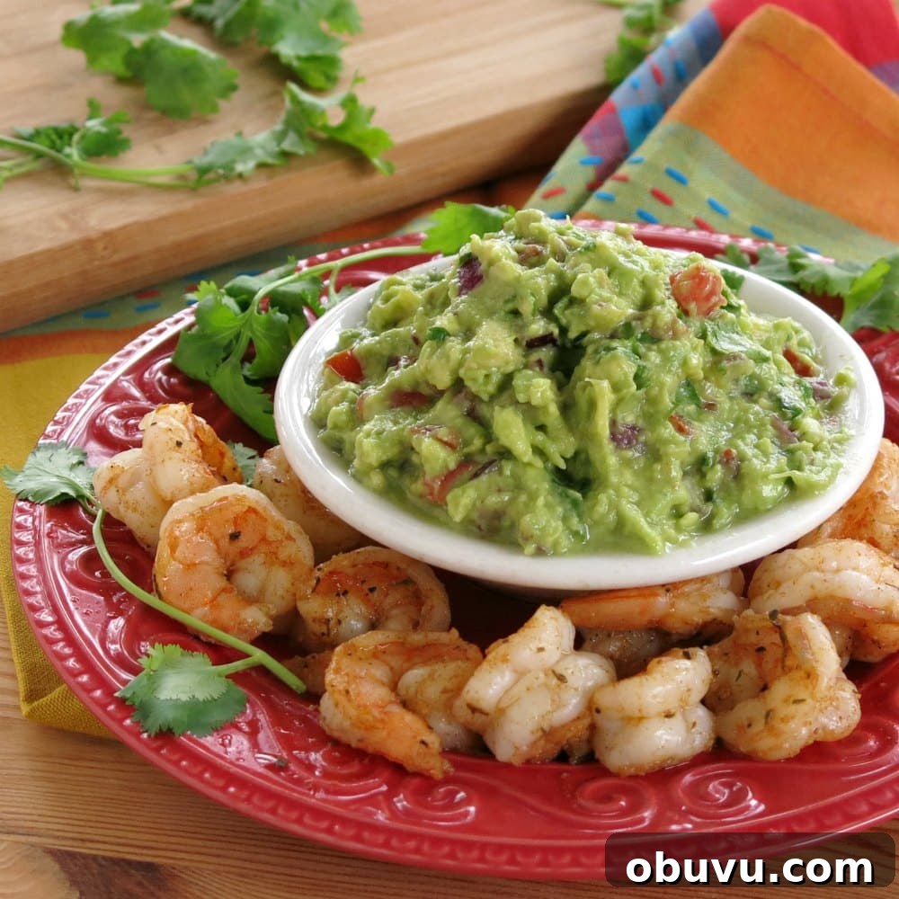 Cajun Shrimp Guacamole Bites: Spicy Shrimp Appetizer Recipe 4 Guacamole surrounded by blackened shrimp.