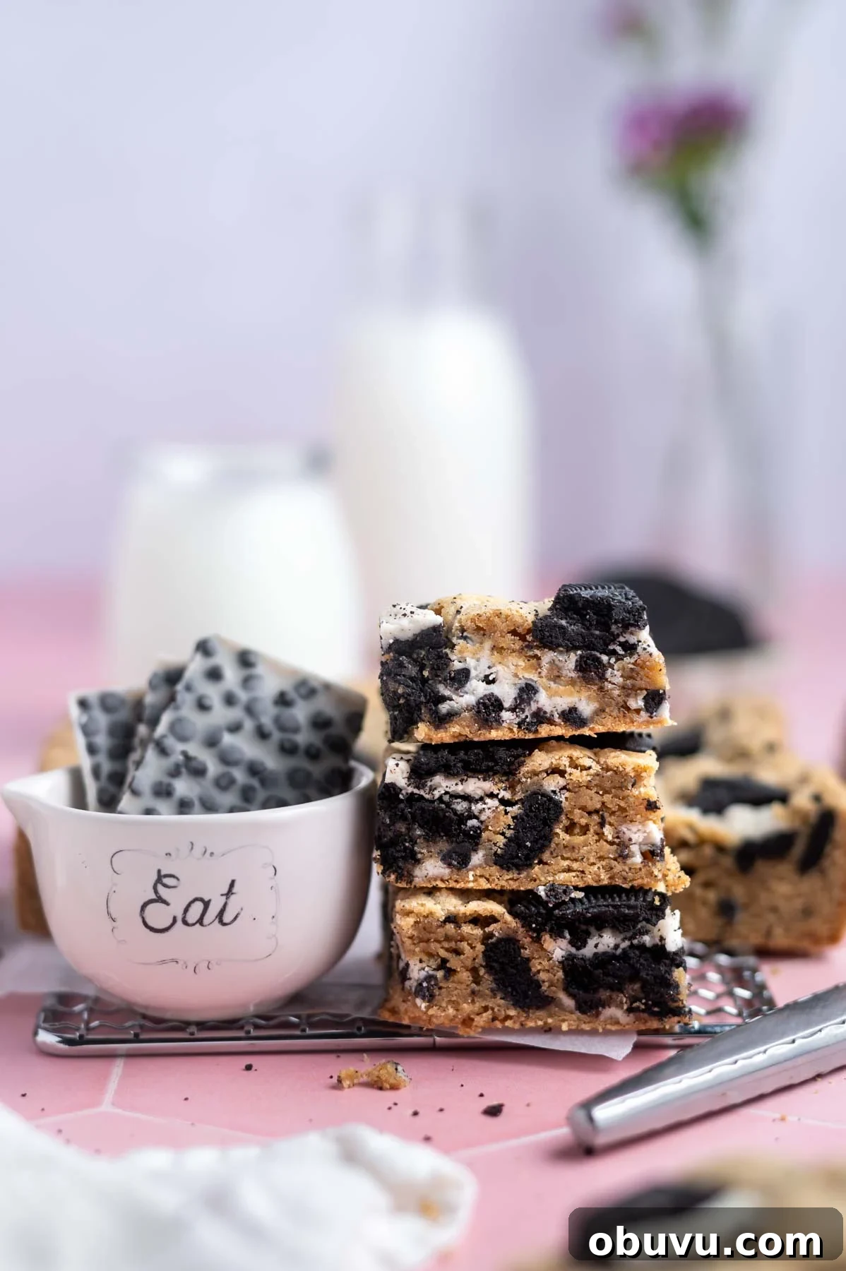 Soft Cookies and Cream Bars Recipe — Chewy & Irresistible 2 stack of cookie bars with Hershey's cookies 'n' cream bars