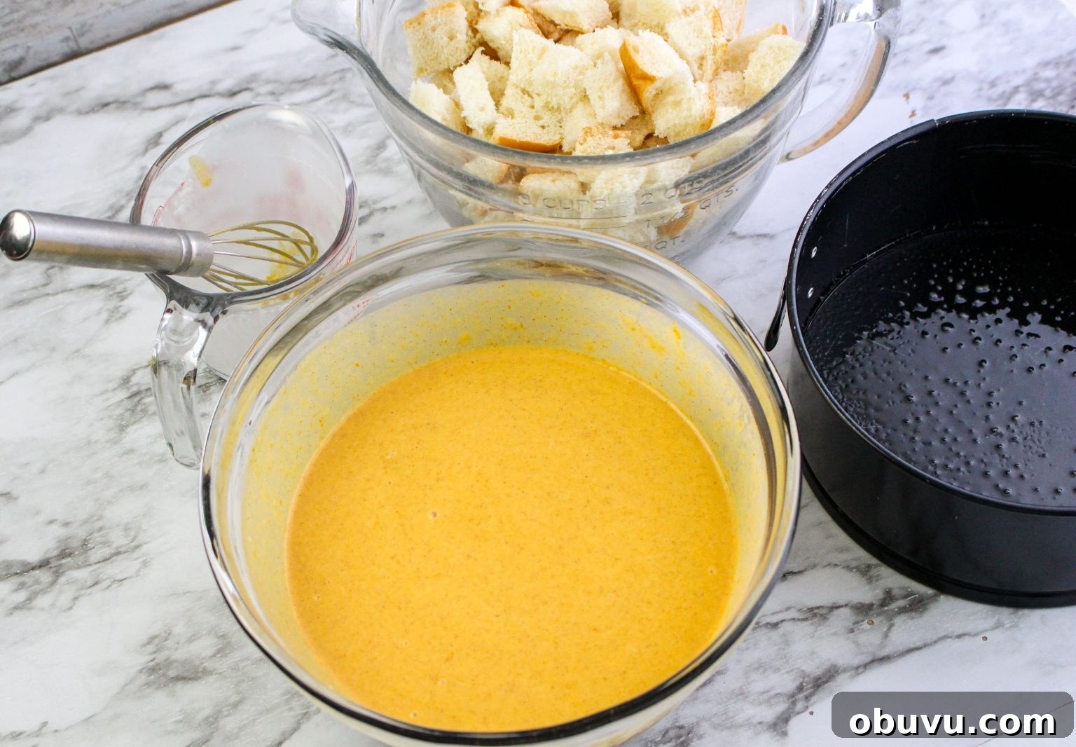 Instant Pot Pumpkin Bread Pudding with Air Fryer Crisp Option 4 Bread Pudding liquid ingredients blended together in a bowl.