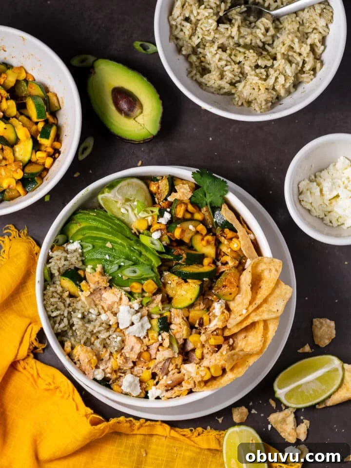 overhead view of the components needed to make street corn chicken rice bowls