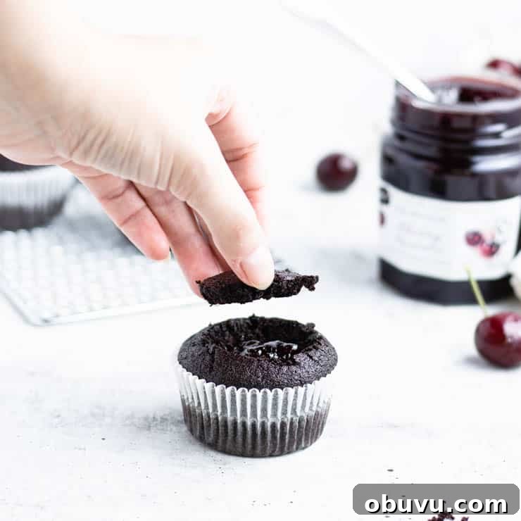 placing piece of cupcake back in the center over the filling.