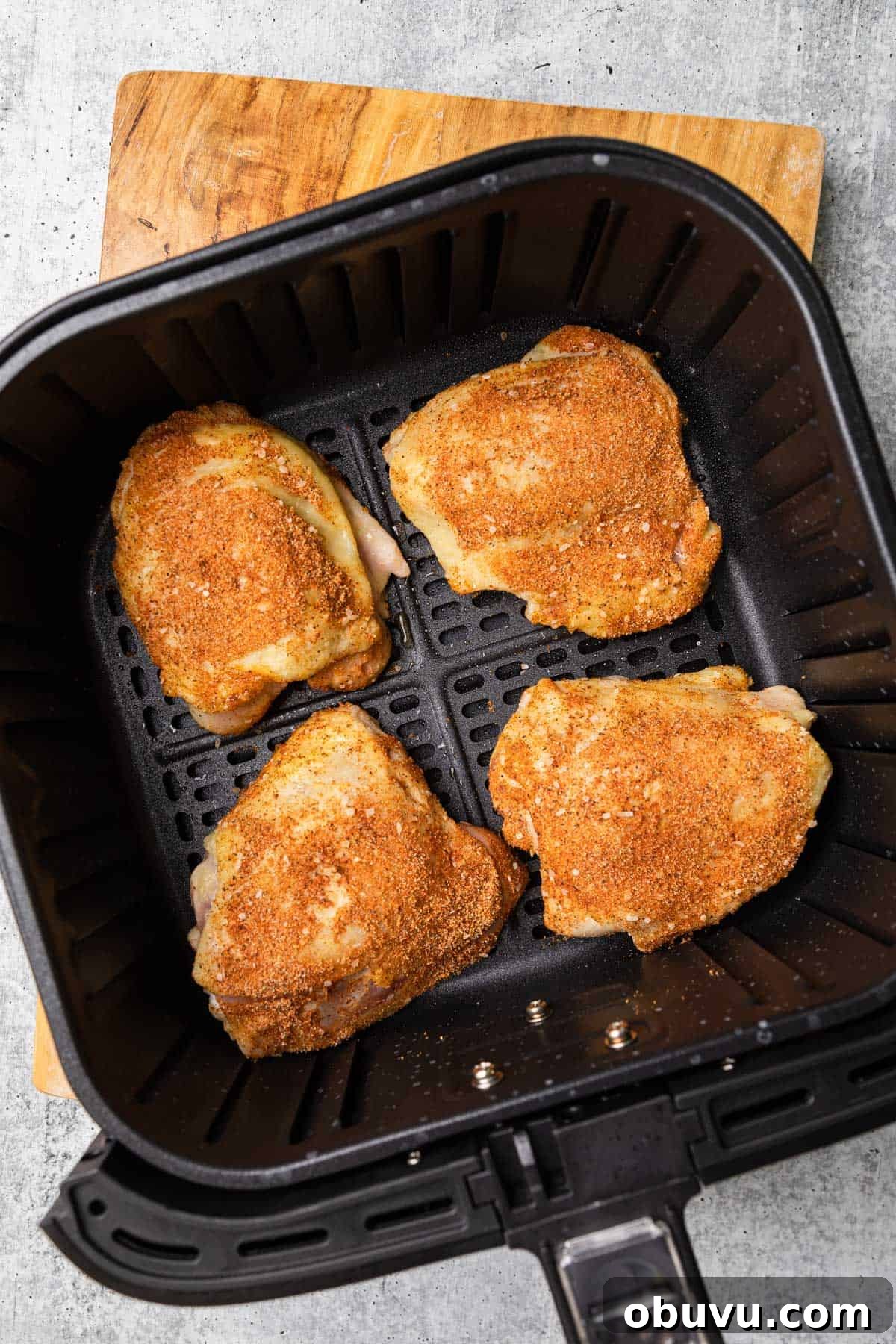 Crispy Air Fryer BBQ Chicken Thighs in 20 Minutes 5 making the recipe