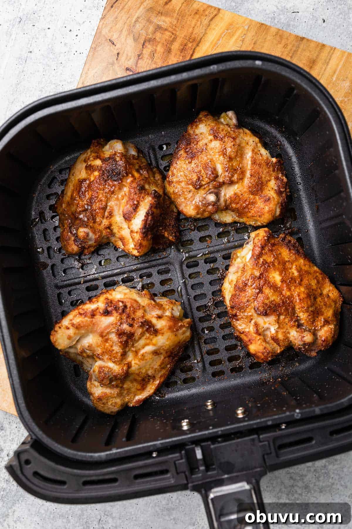 Crispy Air Fryer BBQ Chicken Thighs in 20 Minutes 7 making the recipe
