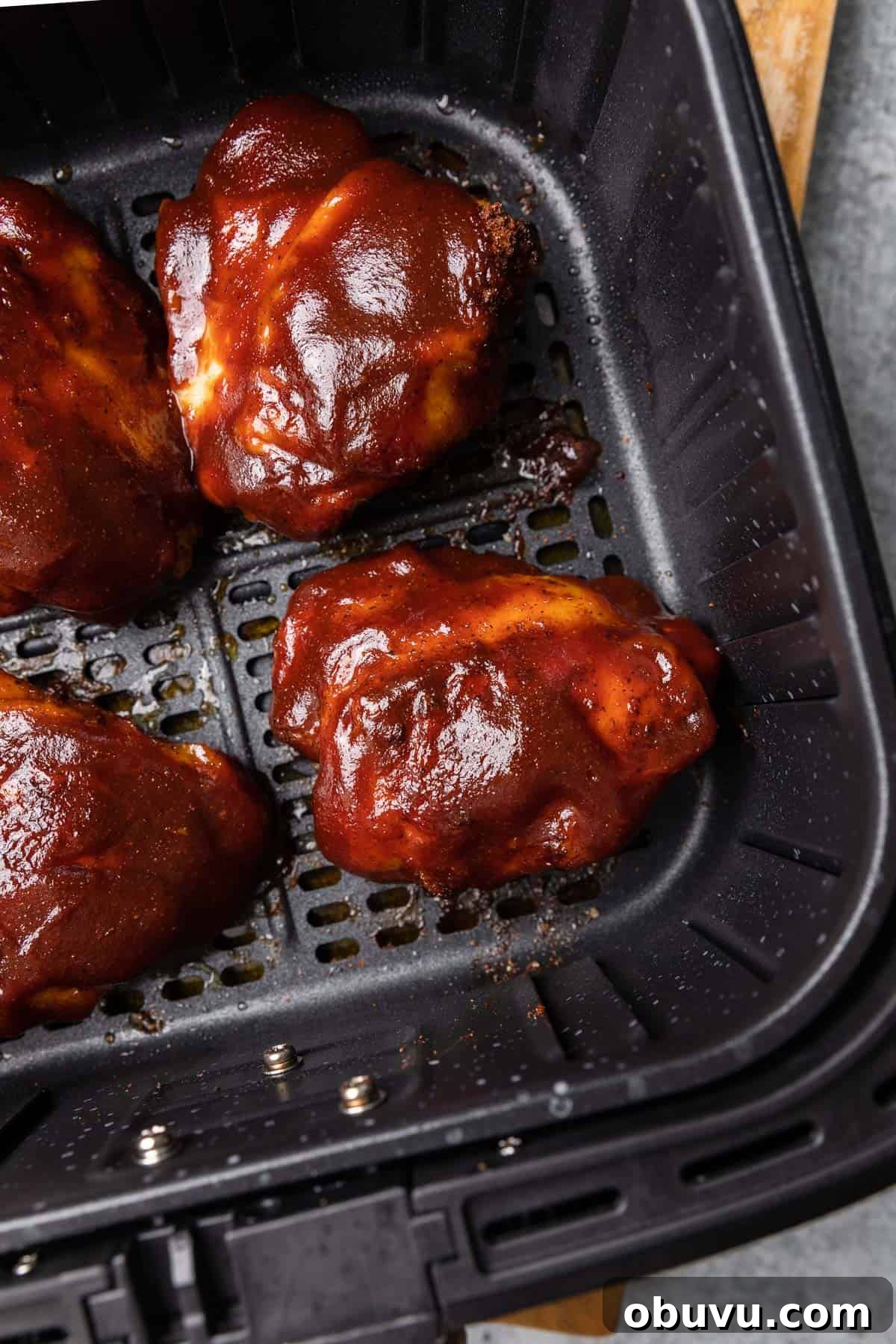 Crispy Air Fryer BBQ Chicken Thighs in 20 Minutes 9 making the recipe
