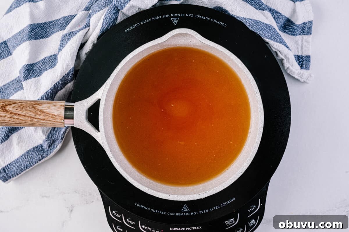 sauce pan with apple cider vinegar, water, honey and salt to make brine for radishes