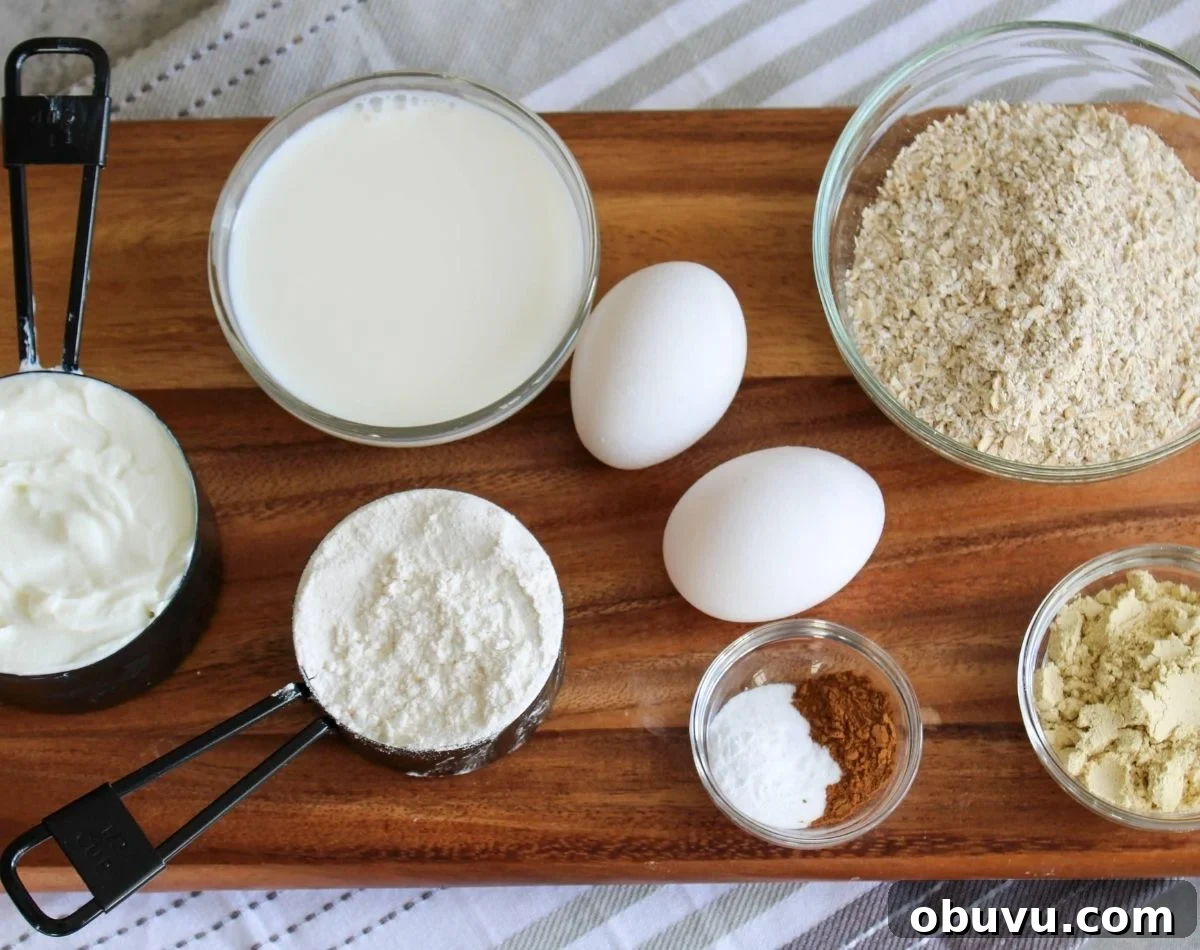 High-Protein Pancake Recipe for More Muscle and Energy 3 bowls and measuring cups of ingredients for pancakes