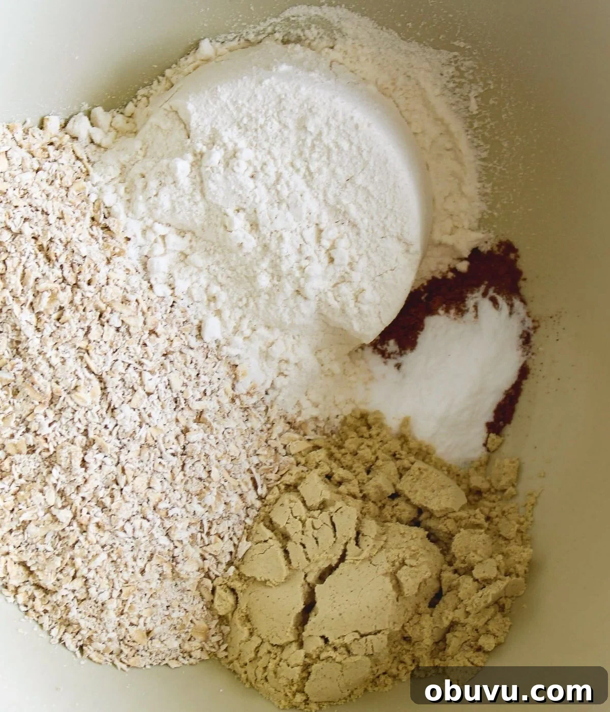 High-Protein Pancake Recipe for More Muscle and Energy 4 Dry ingredients in a mixing bowl ready to be mixed.