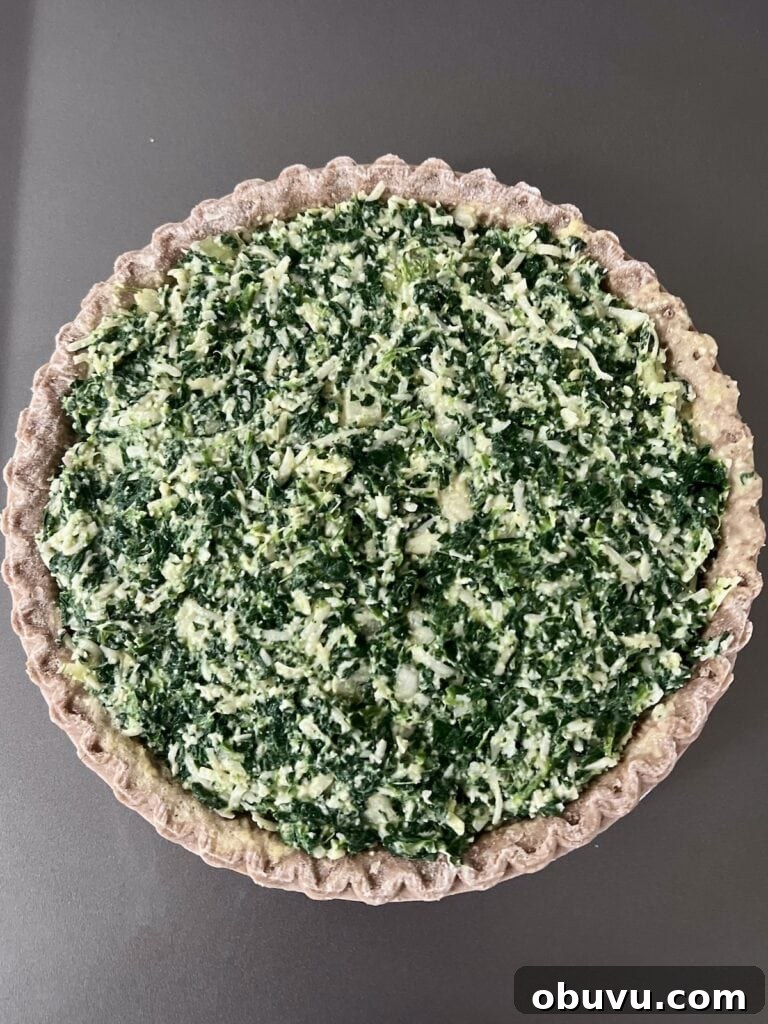 Spinach and Swiss Quiche with Frozen Pie Crust 7 Spinach swiss quiche in frozen pie crust ready for baking.