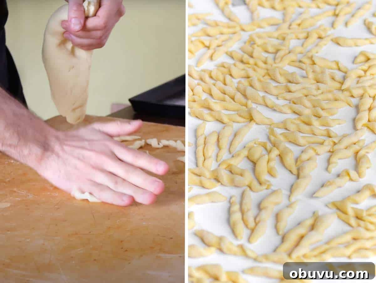 Handmade Trofie Pasta Recipe: Authentic Ligurian Method 6 Step 3 Pinching off small dough piece to roll and shape traditional trofie pasta.