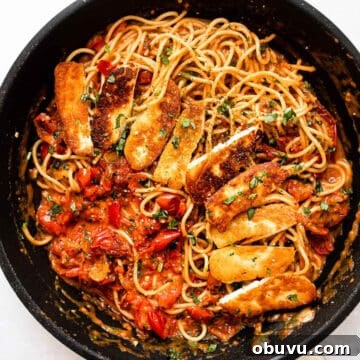 Weekly Family Meal Plan: Budget-Friendly Menu for Week 126 6 Halloumi pasta with tomatoes and spaghetti in a skillet.