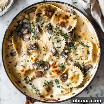 Weekly Family Meal Plan: Budget-Friendly Menu for Week 126 8 Creamy mushroom pasta bake with thyme in a skillet.