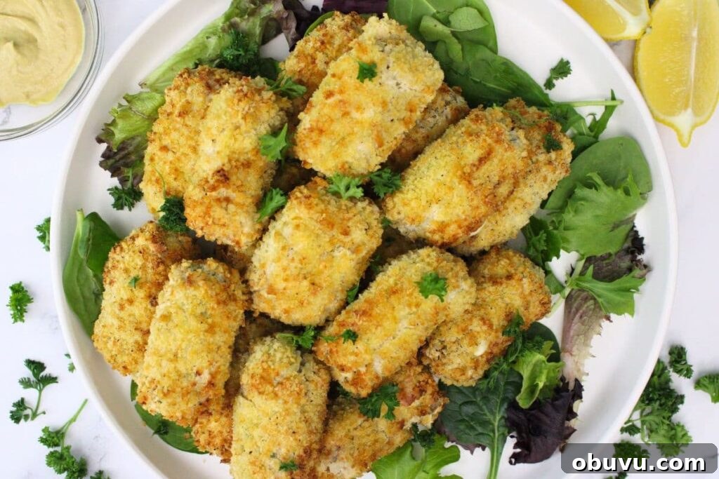 Crispy Air Fryer Chicken Croquettes Made from Leftovers 12 overhead view of air fryer chicken croquettes stacked on a plate