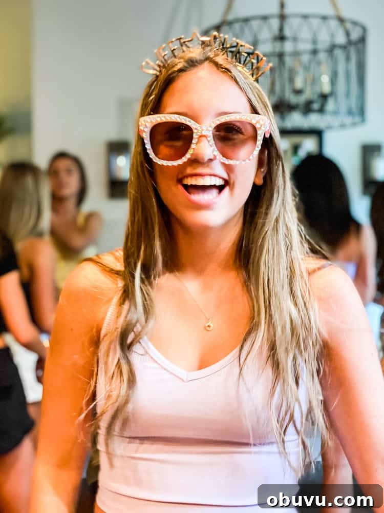 16 year old girl at birthday party smiling wearing sunglasses