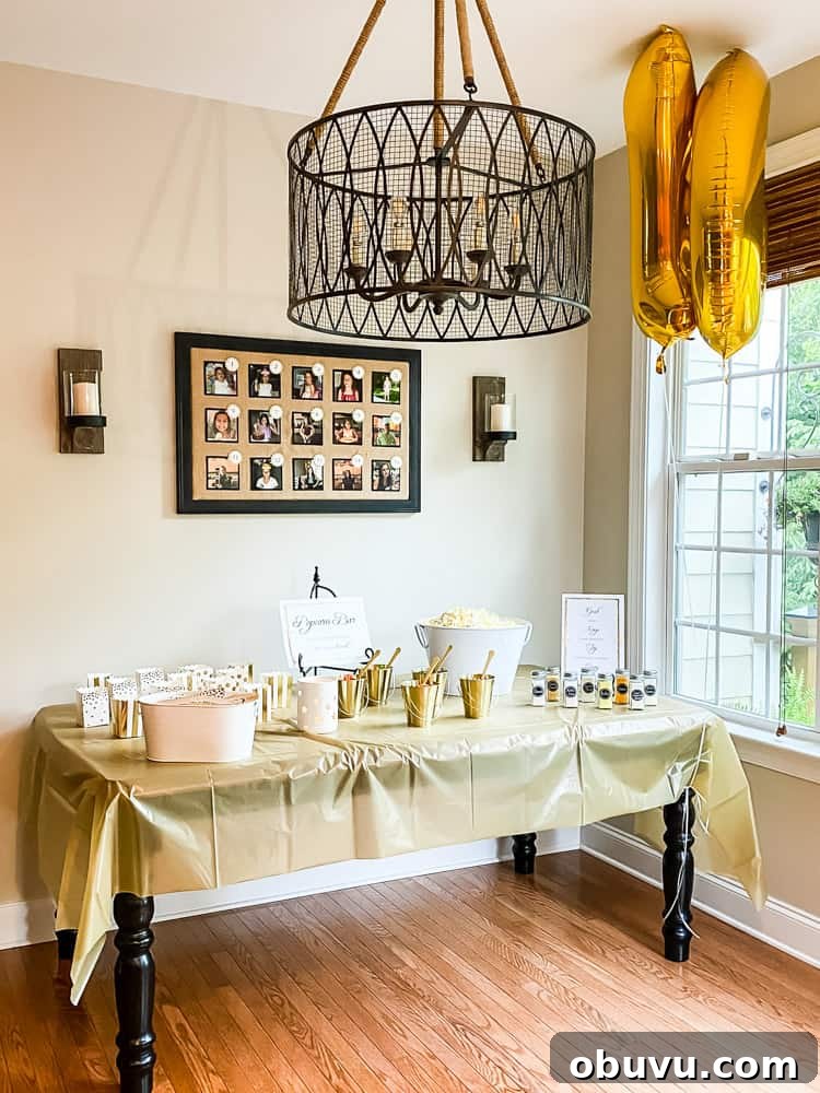 popcorn bar set up on table in kitchen with hanging light fixture hanging from ceiling