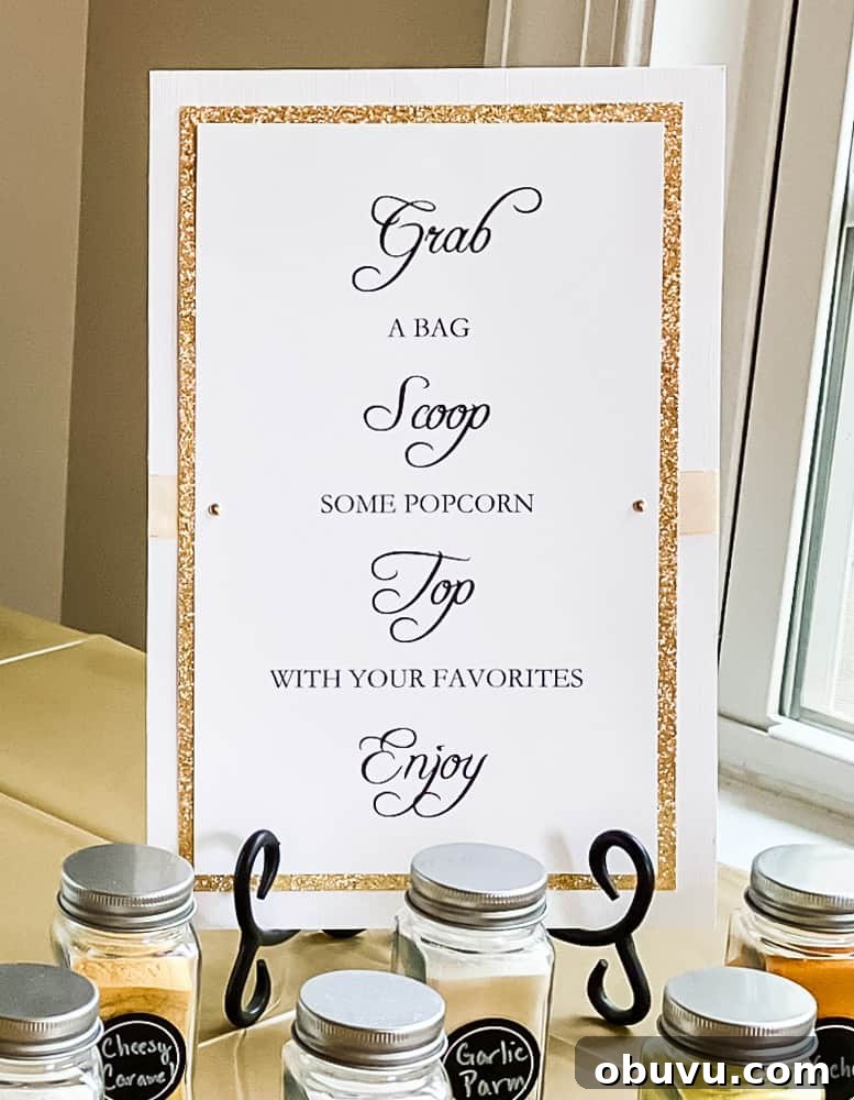 close up of popcorn bar sign on metal picture easel