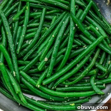 Crispy Pan-Fried Carrots with Garlic and Herbs 12 Square image of green beans.
