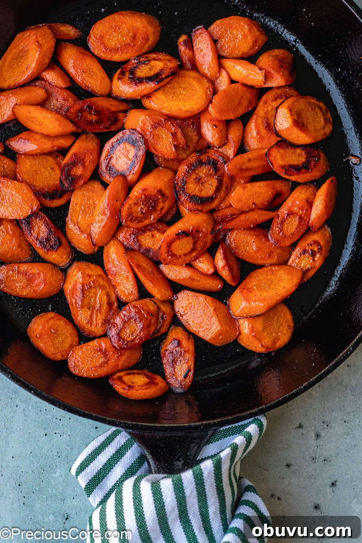 Crispy Pan-Fried Carrots with Garlic and Herbs 6 Cooked Fried Carrots in a Skillet.