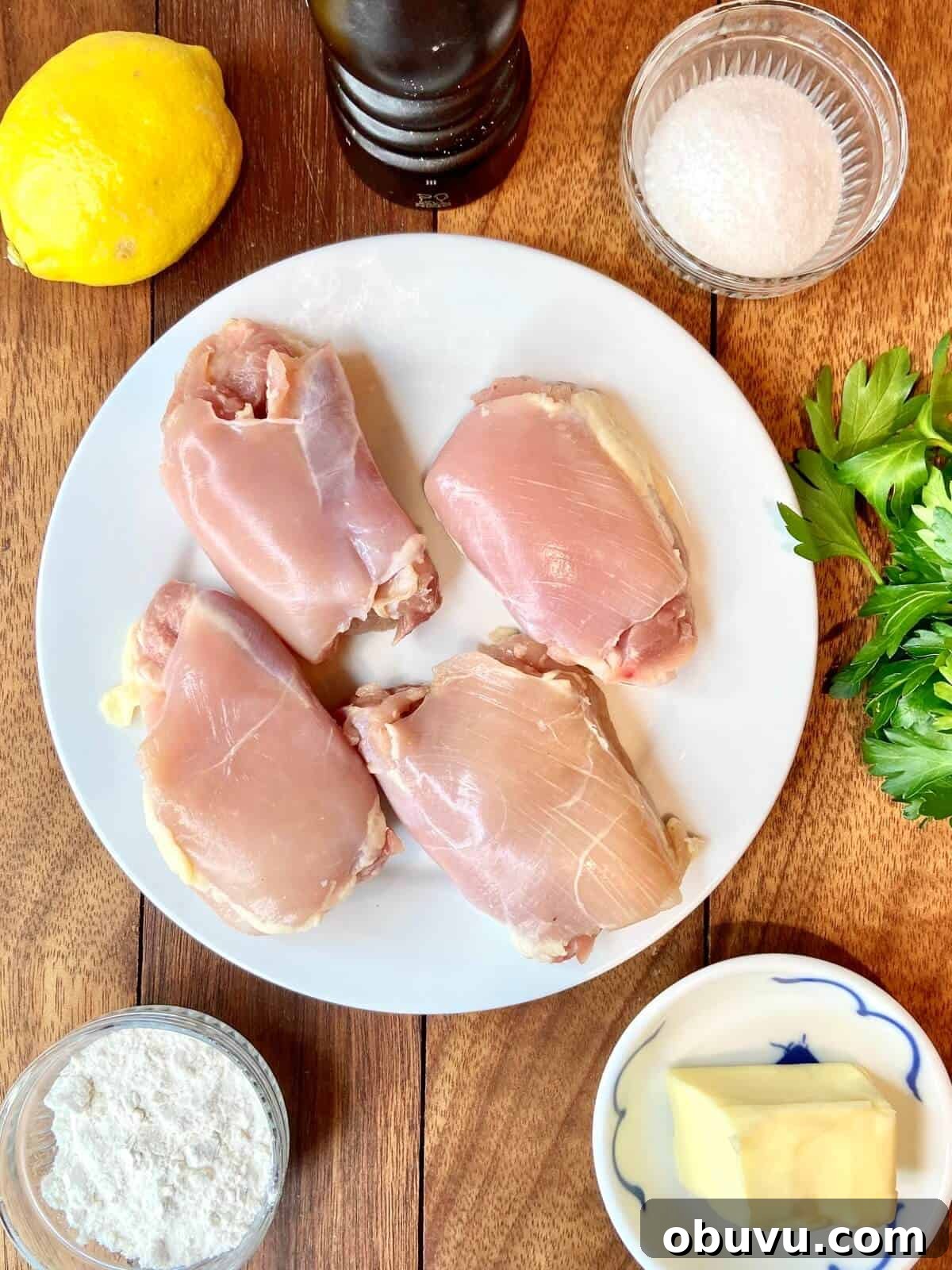 Lemon Scaloppine Recipe: Tender Veal in Zesty Lemon Sauce 4 Ingredients on wood table.