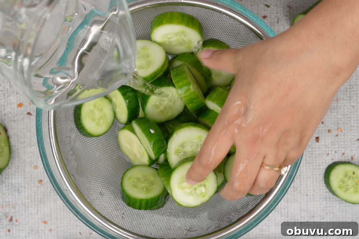 Din Tai Fung-Style Cucumber Salad Recipe That Pops 4 Rinsing the cucumbers with water.