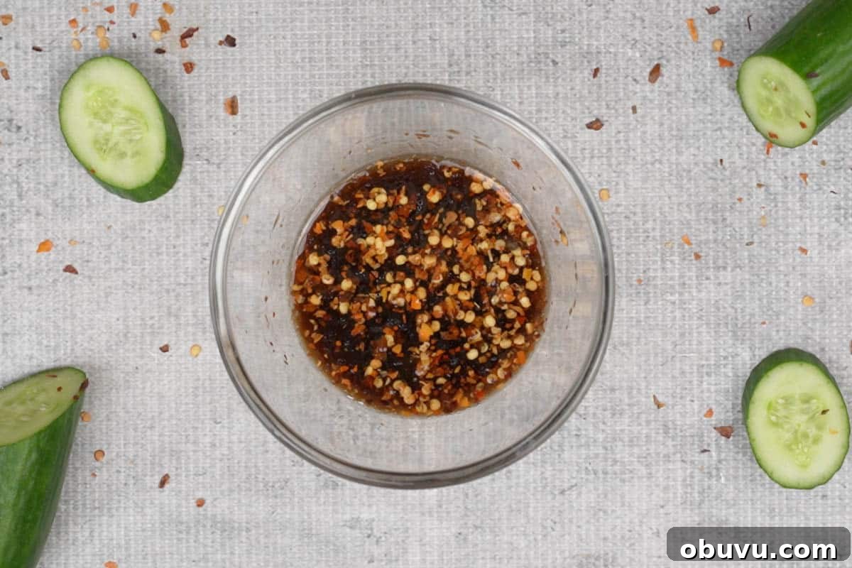 Din Tai Fung-Style Cucumber Salad Recipe That Pops 5 Dressing ingredients mixed in a bowl.