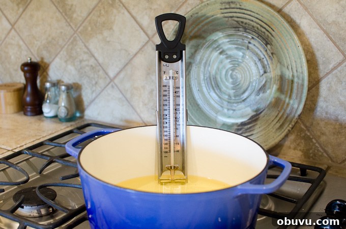 candy thermometer in dutch oven with oil