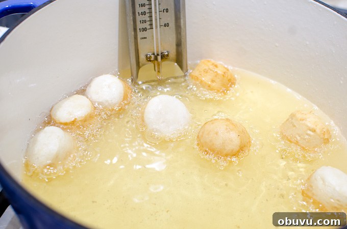 frying donut holes in hot oil