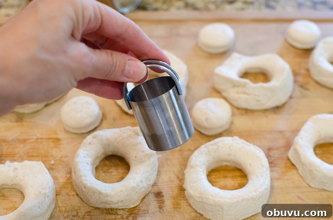 small biscuit cutter and donut dough