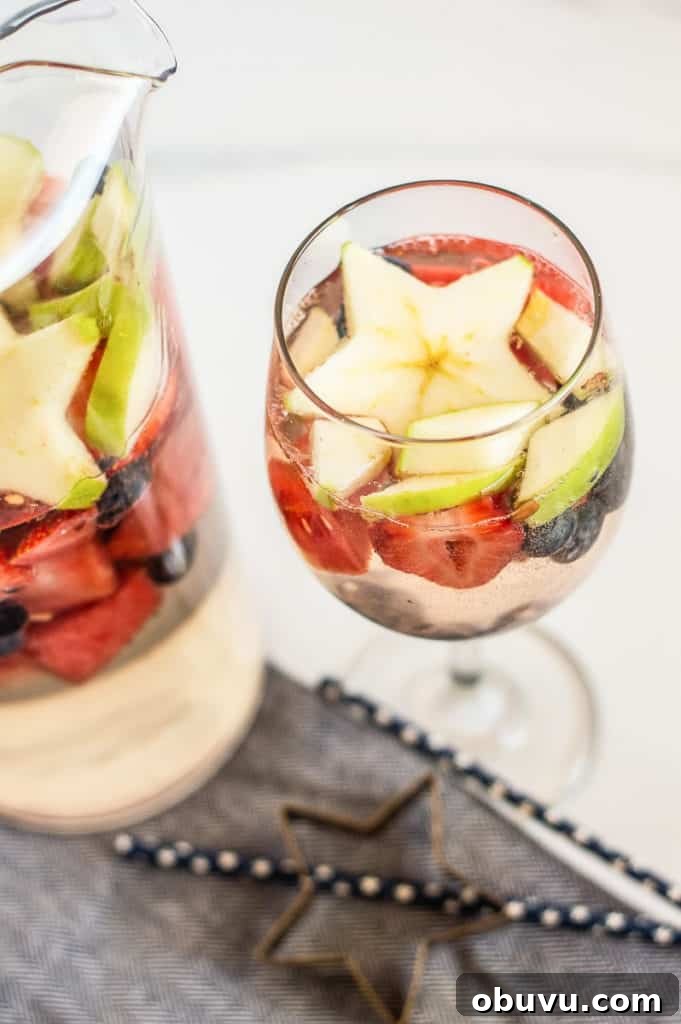 Refreshing 4th of July Cocktails and Festive Mocktails 2 Red, white and blue sangria in a pitcher