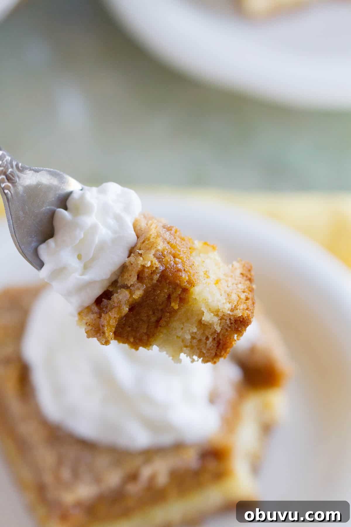 Decadent Pumpkin Pie Layer Cake Recipe 5 Bite of Pumpkin Pie Cake on a fork.