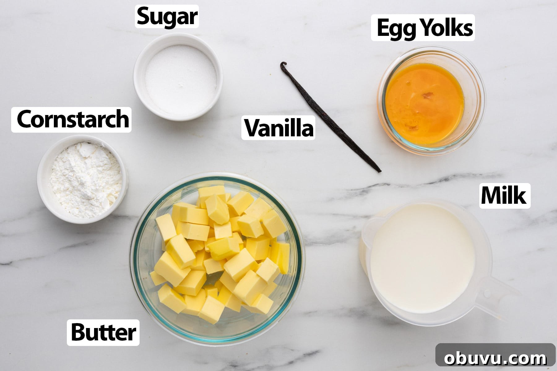 Ingredients laid on a marble surface.