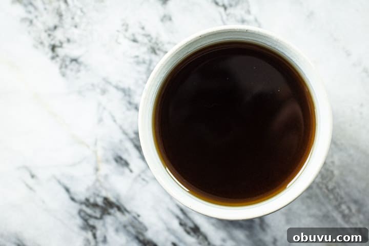 Brew It Stick Review — Is This the Ultimate Camping Coffee Maker? 10 cup of black coffee on a marble surface