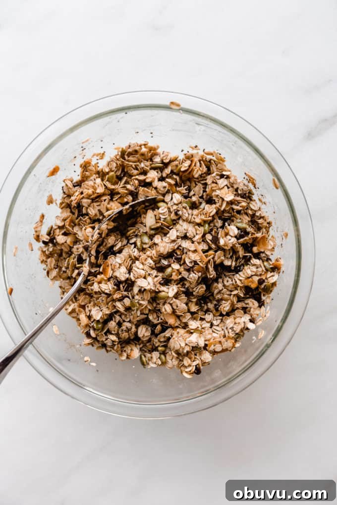 muesli bar ingredients in a mixing bowl