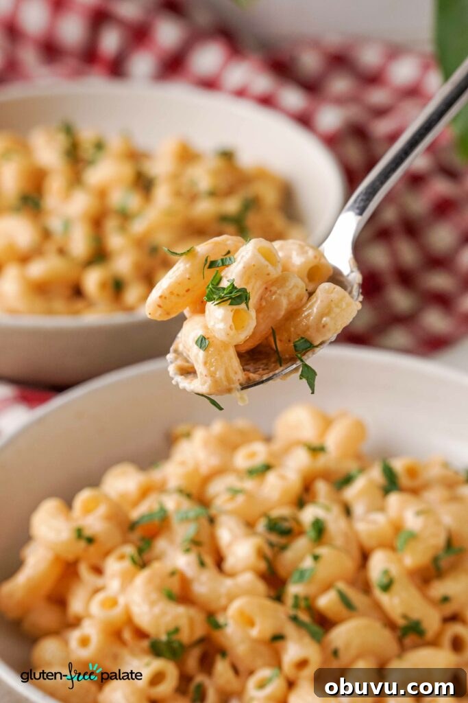 Gluten-free mac and cheese on a fork.