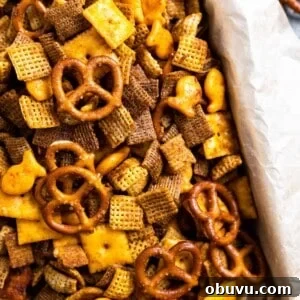 Texas Trash Spicy Chex Mix Recipe — Sweet, Smoky & Fiery 7 Box filled with a spicy chex mix.