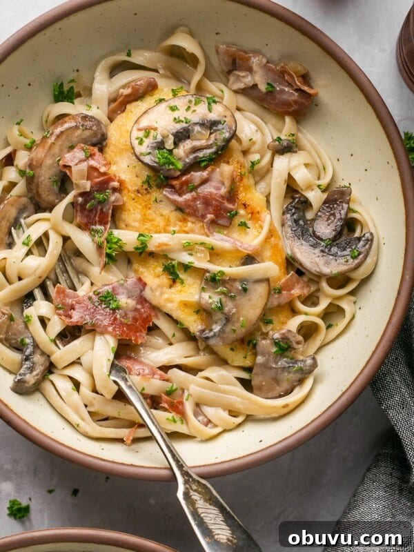 Gluten-Free Marry Me Chicken with Creamy Orzo 11 chicken marsala fettuccine in a bowl with a fork