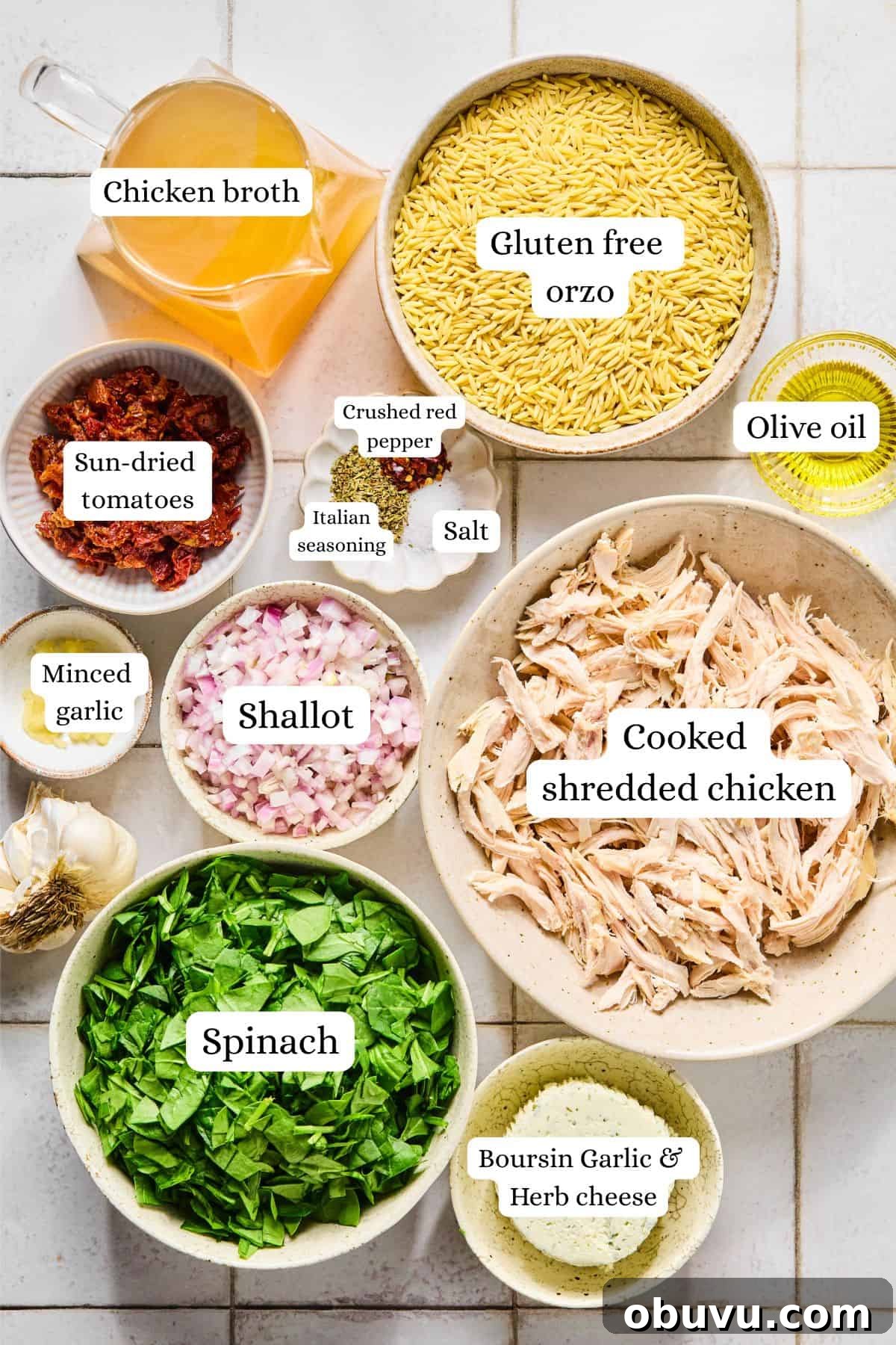Gluten-Free Marry Me Chicken with Creamy Orzo 3 Marry me chicken orzo labeled and arranged in nesting bowls on a white countertop.