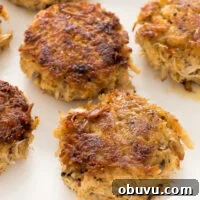 Crispy Crab Cakes with Zesty Lemon Aioli Recipe 6 top shot of cooked crab cakes on white plate