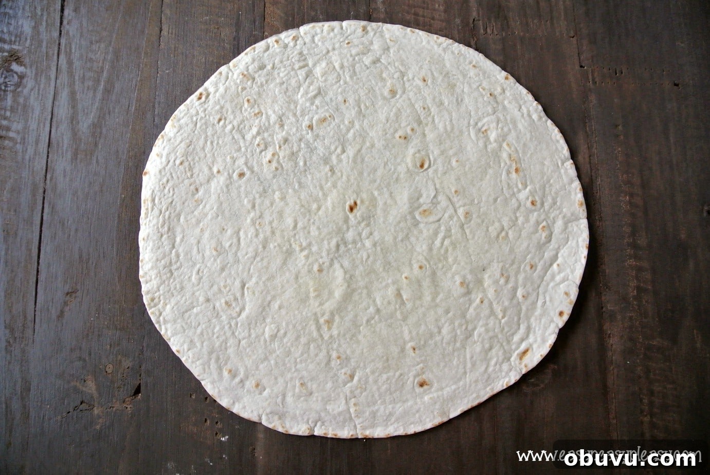 Picture-Perfect Grilled Chicken Wrap: Step-by-Step Rolling Guide 3 How to roll a picture perfect grilled chicken wrap.