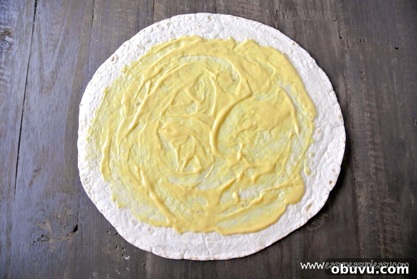 Picture-Perfect Grilled Chicken Wrap: Step-by-Step Rolling Guide 4 How to make a picture perfect wrap. You gotta have the sauce. Step 2.