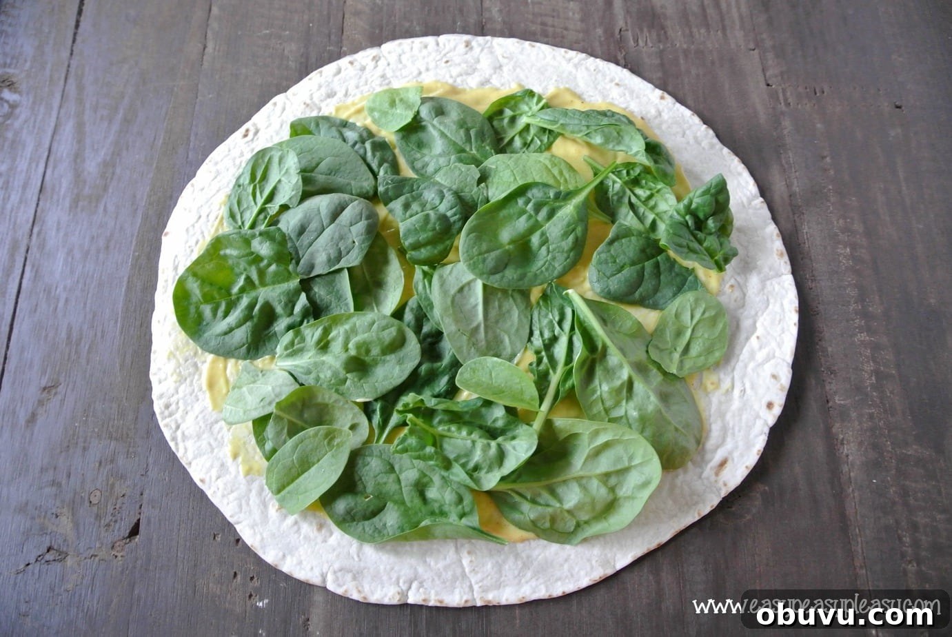 Picture-Perfect Grilled Chicken Wrap: Step-by-Step Rolling Guide 5 How to make a picture perfect wrap. You gotta have the greens!