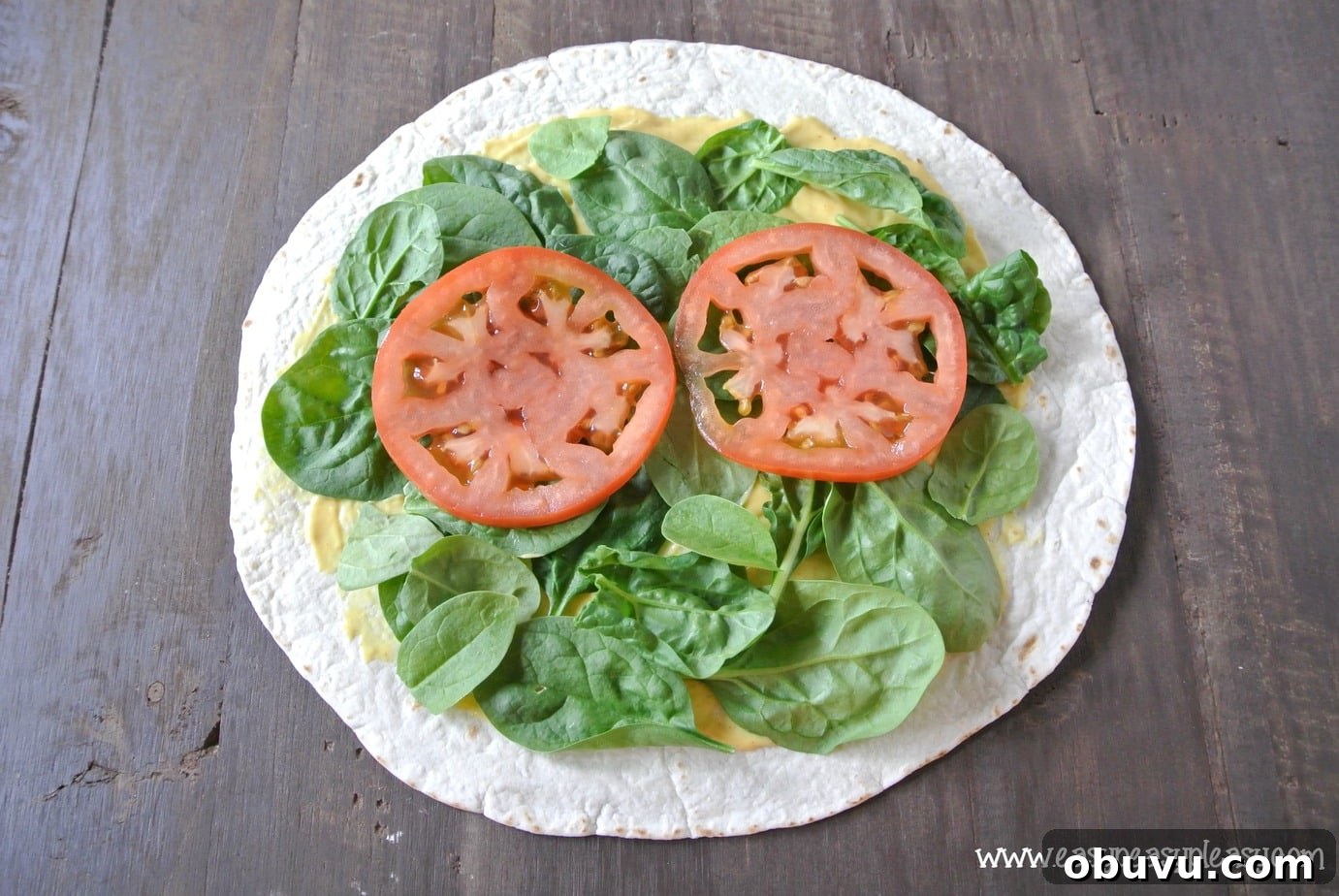 Picture-Perfect Grilled Chicken Wrap: Step-by-Step Rolling Guide 6 How to make a picture perfect wrap. Add all the veggies!