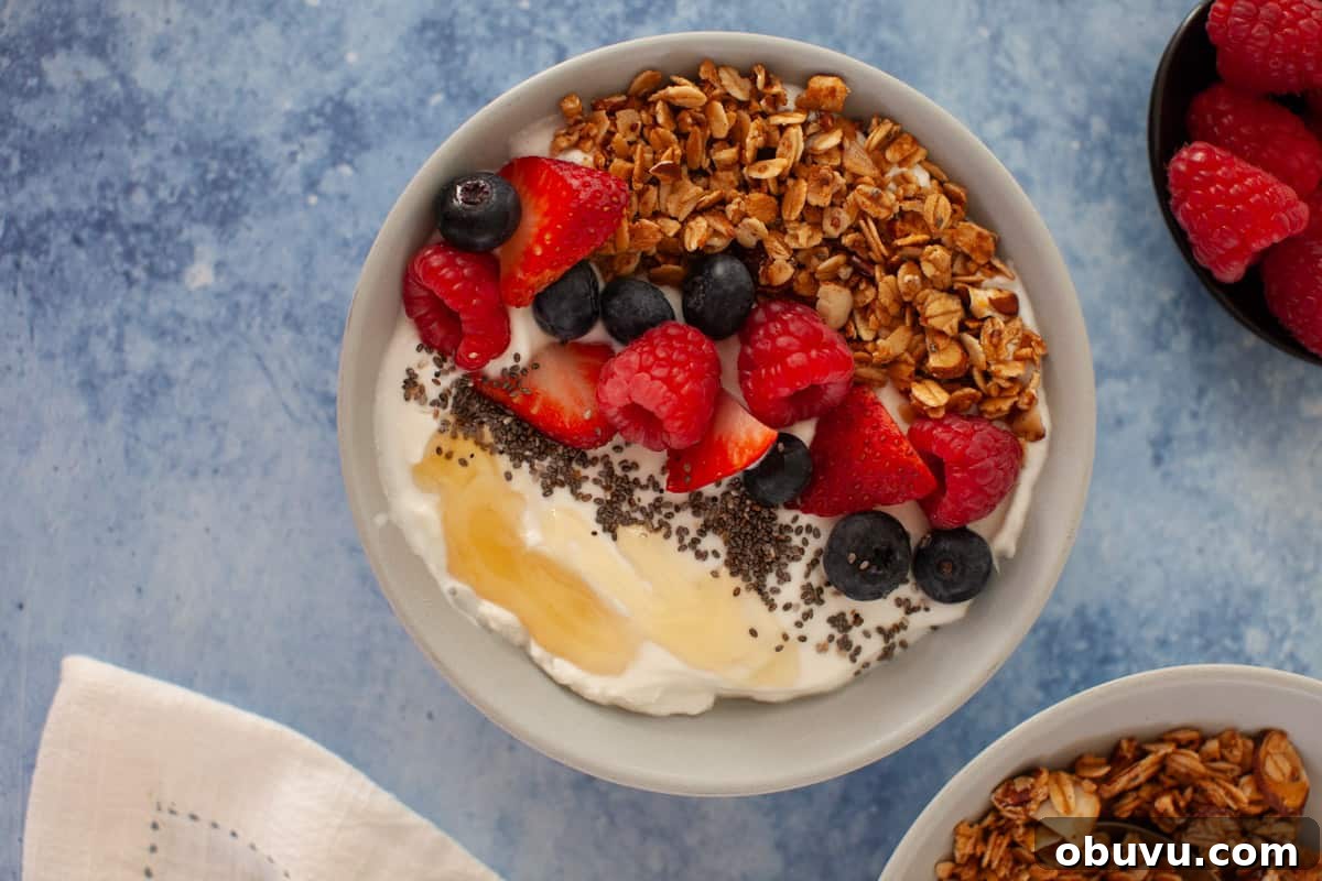 Refreshing Yogurt and Granola Bowl Recipes for Every Morning 10 Yogurt bowl with fruit and toppings.