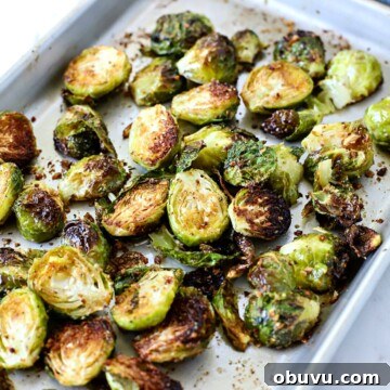 Crispy Oven-Roasted Brussels Sprouts with Balsamic Glaze 10 Baking sheet with Brussels sprouts that roasted.